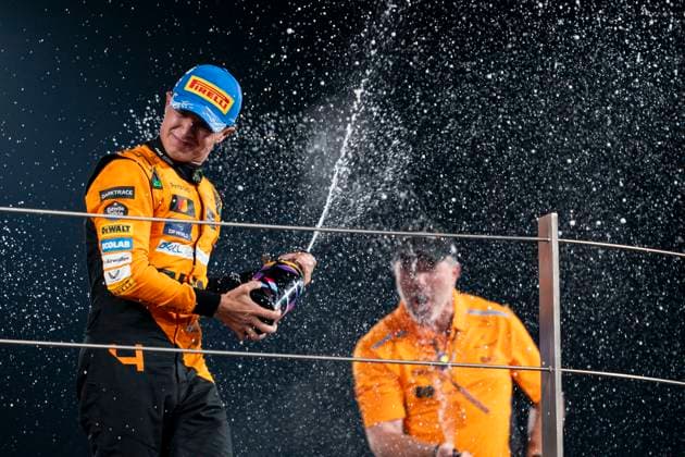 December 8, 2024, Abu Dhabi, United Arab Emirates: British driver LANDO NORRIS (McLaren F1 Team) on the podium after winning the 2024 FIA Formula 1 Abu Dhabi Grand Prix at Yas Marina Circuit in Abu Dhabi, United Arab Emirates. Abu Dhabi United Arab Emirates - ZUMAg147 20241208_fap_g147_051 Copyright: xJamesxGasperottix