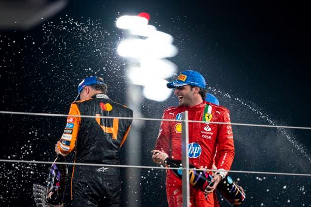 December 8, 2024, Abu Dhabi, United Arab Emirates: (Left to right) British driver LANDO NORRIS (McLaren F1 Team) and Spanish driver CARLOS SAINZ Jr (Scuderia Ferrari) on the podium after the 2024 FIA Formula 1 Abu Dhabi Grand Prix at Yas Marina Circuit in Abu Dhabi, United Arab Emirates. Abu Dhabi United Arab Emirates - ZUMAg147 20241208_fap_g147_052 Copyright: xJamesxGasperottix