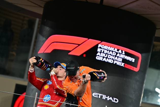 Formula 1 Etihad Airways Abu Dhabi Grand Prix 2024 08 12 2024, Yas Marina Circuit, Abu Dhabi, Formula 1 Etihad Airways Abu Dhabi Grand Prix 2024 , in the picture podium , winner Lando Norris GBR , McLaren F1 Team, 2nd place for Carlos Sainz Jr ESP , Scuderia Ferrari HP, 3rd place for Charles Leclerc MCO , Managing Director Zak Brown McLaren Formula 1 Team nordphotoxGmbHx xBratic nph00250