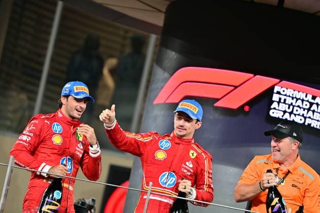 Formula 1 Etihad Airways Abu Dhabi Grand Prix 2024 08 12 2024, Yas Marina Circuit, Abu Dhabi, Formula 1 Etihad Airways Abu Dhabi Grand Prix 2024 , in the picture podium , winner Lando Norris GBR , McLaren F1 Team, 2nd place for Carlos Sainz Jr ESP , Scuderia Ferrari HP, 3rd place for Charles Leclerc MCO , Managing Director Zak Brown McLaren Formula 1 Team nordphotoxGmbHx xBratic nph00250
