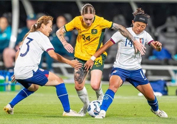 December 7, 2024, Geelong, Victoria, Australia: Chinese Taipei s Australia s Wu Kai-Ching and Chan Pi-Han seen defending on Australia s Sharn Freier during the friendly game opposing the Matildas to Chinese Taipei. Farewell game for Australia s Clare Polkinghorne. Final score Australia 6 - Chinese Taipei 0. Geelong Australia - ZUMAs197 20241207_aaa_s197_547 Copyright: xOlivierxRachonx
