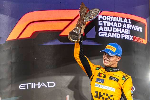 ABU DHABI, UNITED ARAB EMIRATES DECEMBER 08 Race winner Lando Norris of Great Britain and McLaren celebrates on the podium during the F1 Grand Prix of Abu Dhabi at Yas Marina Circuit on December 08, 2024 in Abu Dhabi, United Arab Emirates Abu Dhabi Yas Marina Circuit United Arab Emirates Copyright: xJustPictures.ch EdmundxSox jp-en-EuSpIm-so4_2024-ABUDHAB-F1_20241208_ESR33572