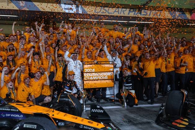 December 8, 2024, Abu Dhabi, United Arab Emirates: Oscar Piastri, Lando Norris and Zak Brown of McLaren celebrate with the team winning constructors cchampionship during Formula 1 Abu Dhabi Grand Prix at Yas Marina Circuit on December 8th, 2024 in Abu Dhabi, United Arab Emirates. Abu Dhabi United Arab Emirates - ZUMAz156 0783758069st Copyright: xBeataxZawrzelx