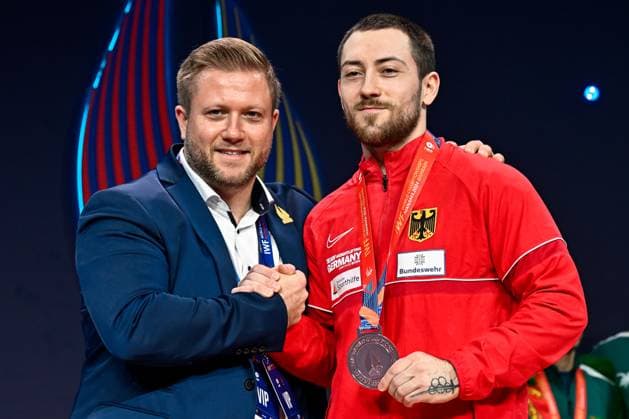 Sport Themen der Woche KW50 Roberto Gutu of Germany after the clean & jerk, in the 73 kg men category during the 2024 IWF World Championships at the IWF Arena in Manama, Bahrain, December 09, 2024. GiorgioxScala