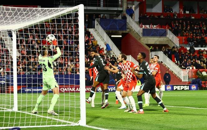 Paulo Gazzaniga of Girona saves a header from Joe Gomez of Liverpool early on Girona v Liverpool, UEFA Champions League, Group Stage, Football, Estadi Montilivi, Girona, Spain - 10 Dec 2024 EDITORIAL USE ONLY No use with unauthorised audio, video, data, fixture lists, club league logos or live services. Online in-match use limited to 120 images, no video emulation. No use in betting, games or single club league player publications.  Copyright: xKieranxMcManus Shutterstockx 14984460o
