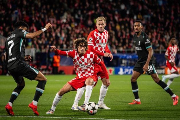 December 10, 2024, Girona, France, Spain: Bryan GIL of Girona, Donny VAN DE BEEK of Girona and Ryan GRAVENBERCH of Liverpool during the UEFA Champions League, League Phase MD6 match between Girona FC and FC Liverpool at Montilivi Stadium on December 10, 2024 in Girona, Spain. Girona Spain - ZUMAm308 20241210_zsp_m308_001 Copyright: xMatthieuxMirvillex