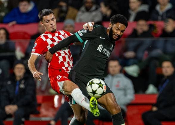 Football - UEFA Champions League - League Phase - Girona FC v Liverpool FC GIRONA, SPAIN - Tuesday, December 10, 2024: Liverpool s Joe Gomez is challenged by Girona s Miguel GutiÃ rrez (L) during the UEFA Champions League Matchday 6 game between Girona FC and Liverpool FC at the Estadi Montilivi. (Photo by David Rawcliffe Propaganda) GIRONA Estadi Montilivi CATALONIA SPAIN  Copyright: xDavidxRawcliffex P2024-12-10-Girona_Liverpool-20
