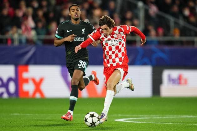 Brian Gil of Girona FC and Ryan Gravenberch of Liverpool FC Girona FC v Liverpool FC. UEFA Champions League match. Date 6. Football, Montilivi Stadium, Girona, Spain - 10 Dec 2024 Editorial use only  Copyright: xBaguxBlanco PRESSINPHOTO Shutterstockx 14990368j
