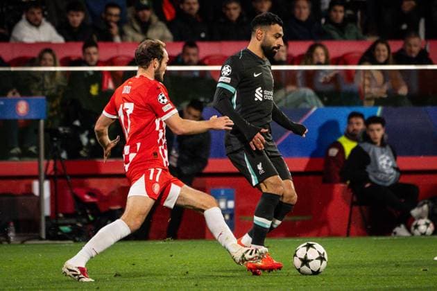 December 10, 2024, Girona, France, Spain: Daley BLIND of Girona and Mohamed SALAH of Liverpool during the UEFA Champions League, League Phase MD6 match between Girona FC and FC Liverpool at Montilivi Stadium on December 10, 2024 in Girona, Spain. Girona Spain - ZUMAm308 20241210_zsp_m308_004 Copyright: xMatthieuxMirvillex