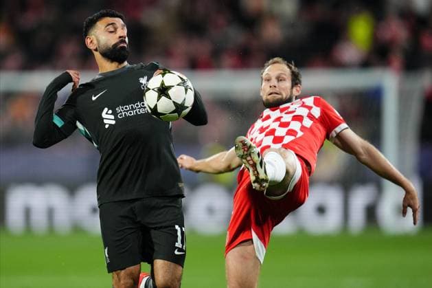 Mohamed Salah of Liverpool FC and Daley Blind of Girona FC Girona FC v Liverpool FC. UEFA Champions League match. Date 6. Football, Montilivi Stadium, Girona, Spain - 10 Dec 2024 Editorial use only  Copyright: xBaguxBlanco PRESSINPHOTO Shutterstockx 14990368k