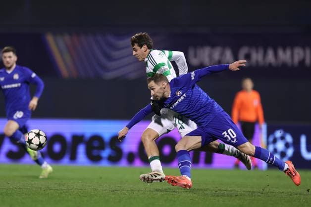 GNK Dinamo v Celtic FC - UEFA Champions League 2024 25 League Phase MD6 ZAGREB, CROATIA - DECEMBER 10: Paulo Bernardo of Celtic is challenged by Marko Rog of Dinamo Zagreb during UEFA Champions League League Phase MD6 match between Dinamo Zagreb and Celtic at Stadion Maksimir on December 10, 2024 in Zagreb, Croatia.  GoranxStanzl PIXSELL