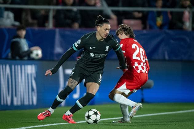 Darwin Nunez Liverpool FC and Bryan Gil Girona FC battle for the ball during a UEFA Champions League match between Girona FC and Liverpool FC at Estadi Municipal de Montilivi in Girona, Girona, Spain, on December 10 2024 Photo by Felipe Mondino Copyright: x@FELIPExMONDINOx