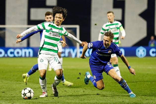 Reo Hatate of Celtic battles with Lukas Kacavenda of Dinamo Zagreb Dinamo Zagreb v Celtic, UEFA Champions League, Group Stage, Football, Maksimir Stadium, Zagreb, Croatia, UK - 10 Dec 2024 EDITORIAL USE ONLY No use with unauthorised audio, video, data, fixture lists, club league logos or live services. Online in-match use limited to 120 images, no video emulation. No use in betting, games or single club league player publications.  Copyright: xNikolaxKrstic Shutterstockx 14984446cj