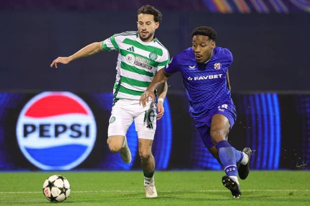 Nicolas Kühn of Celtic (L) battles with RonaÃ«l Pierre-Gabriel of Dinamo Zagreb (R) Dinamo Zagreb v Celtic, UEFA Champions League, Group Stage, Football, Maksimir Stadium, Zagreb, Croatia, UK - 10 Dec 2024 EDITORIAL USE ONLY No use with unauthorised audio, video, data, fixture lists, club league logos or live services. Online in-match use limited to 120 images, no video emulation. No use in betting, games or single club league player publications.  Copyright: xNikolaxKrstic Shutterstockx 14984446db