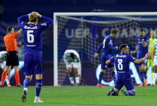 GNK Dinamo v Celtic FC - UEFA Champions League 2024 25 League Phase MD6 ZAGREB, CROATIA - DECEMBER 10: Maxime Bernauer of Dinamo Zagreb and Lukas Kacavenda of Dinamo Zagreb reacts during UEFA Champions League League Phase MD6 match between Dinamo Zagreb and Celtic at Stadion Maksimir on December 10, 2024 in Zagreb, Croatia.  SanjinxStrukic PIXSELL