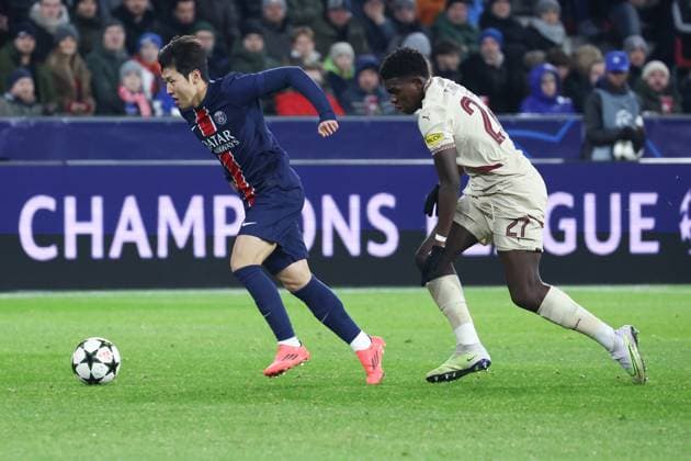 SOCCER - UEFA CL, RBS vs PSG SALZBURG,AUSTRIA,10.DEC.24 - SOCCER - UEFA Champions League, Red Bull Salzburg vs Paris Saint German. Image shows Lee Kang-in (PSG) and Lucas Gourna-Douath (RBS).  GEPAxpictures xDavidxGeieregger