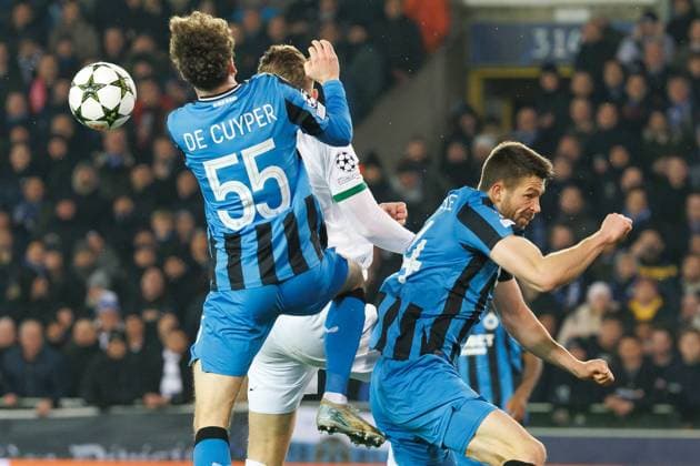 Club s Maxim De Cuyper, Sporting s Viktor Gyokeres and Club s Brandon Mechele fight for the ball during a soccer game between Belgian Club Brugge KV and Portuguese club Sporting CP, Tuesday 10 December 2024 in Brugge, on the sixth day of the UEFA Champions League league phase. KURTxDESPLENTER  x107894519x