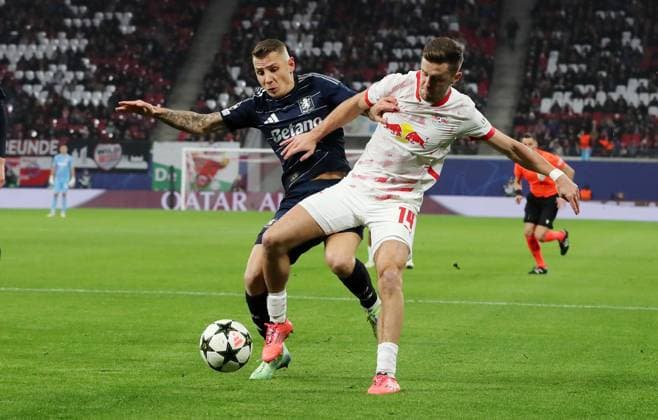 Lucas Digne, Christoph Baumgartner duel Match scene Action Sport Football Soccer UEFA Champions League UCL Men 6 Matchday Season 2024 2025 10 12 2024 Rasen Ballsport RB Leipzig RBL vs Aston Villa DFL regulations prohibit any use of photographs as image sequences and or quasi video