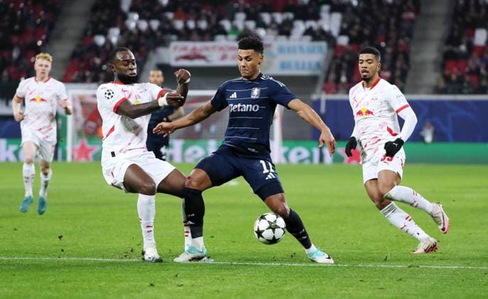 Lutsharel Geertruida, Ollie Watkins on the ball, Benjamin Henrichs duel Match scene Action Sport Football Soccer UEFA Champions League UCL Men 6 Matchday Season 2024 2025 10 12 2024 Rasen Ballsport RB Leipzig RBL vs Aston Villa DFL regulations prohibit any use of photographs as image sequences and or quasi video