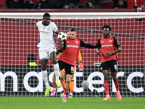 Marcus Thuram Inter Milan and Florian Wirtz Bayer 04 Leverkusen in a duel during the UEFA Champions League 2024 25 League Phase MD6 match between Bayer 04 Leverkusen and Inter Milan, BayArena on December 10, 2024 in Leverkusen, Germany, Germany Photo by Ralf Treese DeFodi Images Marcus Thuram Inter Milan and Florian Wirtz Bayer 04 Leverkusen in a duel during the UEFA Champions League 2024 25 League Phase MD6 match between Bayer 04 Leverkusen and FC Internazionale Milano at BayArena on December 10, 2024 in Leverkusen, Germany Defodi 521 LEVINT20241210 007 Defodi-521