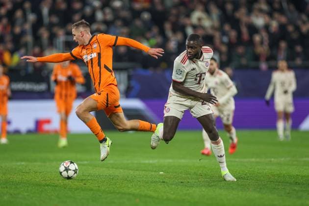 10 12 2024, Football, Season 2024 2025, Champions League, Matchday 6, Shakhtar Donetsk FC Bayern Munich, f l Shakhtars Danylo Sikan, Dayot Upamecano FC Bayern Munich Gelsenkirchen Veltins Arena NRW Germany xRHR PHOTO TRx Copyright: TimxRehbein RHR-FOTOx RHR-FOTO TR