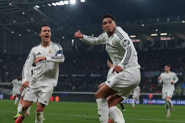 Bergamo, Italy, 10th December 2024. Jude Bellingham of Real Madrid celebrates with team mate Lucas Vazquez after scoring to give the side a 3-1 lead during the UEFA Champions League match at Stadio di Bergamo, Bergamo. Picture credit should read: Jonathan Moscrop Sportimage EDITORIAL USE ONLY. No use with unauthorised audio, video, data, fixture lists, club league logos or live services. Online in-match use limited to 120 images, no video emulation. No use in betting, games or single club league player publications. SPI-3516-0024