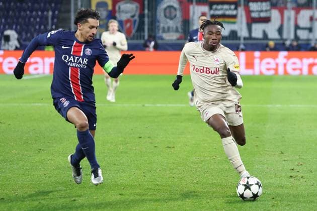 SOCCER - UEFA CL, RBS vs PSG SALZBURG,AUSTRIA,10.DEC.24 - SOCCER - UEFA Champions League, Red Bull Salzburg vs Paris Saint German. Image shows Marquinhos (PSG) and Dorgeles Nene (RBS).  GEPAxpictures xDavidxGeieregger