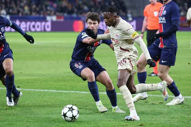 SOCCER - UEFA CL, RBS vs PSG SALZBURG,AUSTRIA,10.DEC.24 - SOCCER - UEFA Champions League, Red Bull Salzburg vs Paris Saint German. Image shows Joao Neves (PSG) and Dorgeles Nene (RBS).  GEPAxpictures xDavidxGeieregger