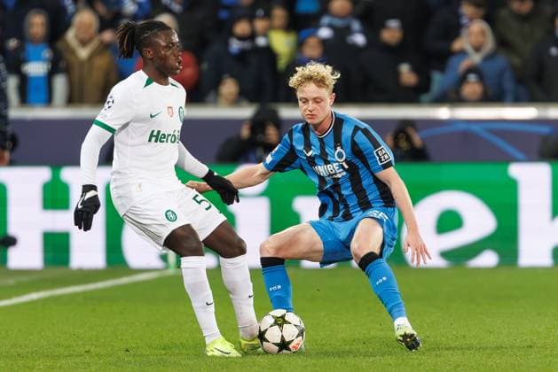 Sporting s Hidemasa Morita and Club s Joaquin Seys fight for the ball during a soccer game between Belgian Club Brugge KV and Portuguese club Sporting CP, Tuesday 10 December 2024 in Brugge, on the sixth day of the UEFA Champions League league phase. KURTxDESPLENTER  x107901338x
