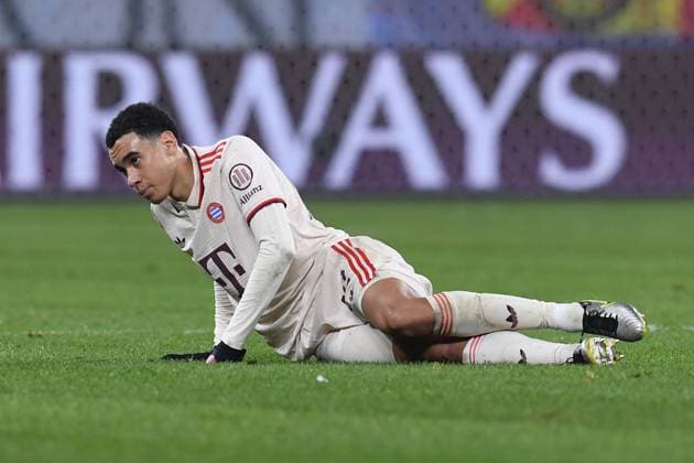 Soccer UEFA Champions League matchday 6 Shakhtar Donetsk FC Bayern Munich on 10 12 2024 at the Arena AufSchalke in Gelsenkirchen Jamal Musiala Munich injured on the ground xRx