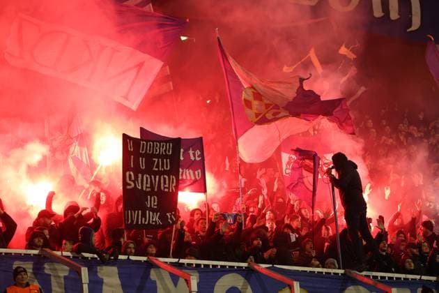 Zagreb, 10.12.2024. - Maksimir Stadium, UEFA CHAMPIONS LEAGUE - 2024 25, League phase, Matchday 6, GNK Dinamo - Celtic. Bad Blue Boys, Dinamo™s supporters on north stand with red flares and flags 