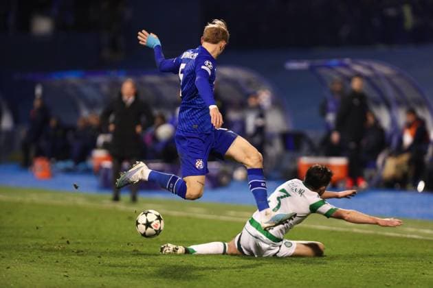 Zagreb, 10.12.2024. - Maksimir Stadium, UEFA CHAMPIONS LEAGUE - 2024 25, League phase, Matchday 6, GNK Dinamo - Celtic. Maxime Bernauer (6) and Greg Taylor (3) 