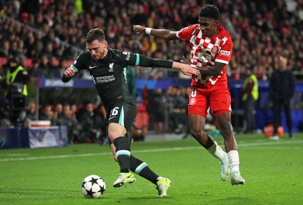 Girona FC v Liverpool FC - UEFA Champions League 2024 25 League Phase MD6 Andrew Robertson and Yaser Asprilla play during the match between Girona FC and Liverpool FC, corresponding to week 6 of the League Stage of the UEFA Champions League, at the Montilivi Stadium in Girona, Spain, on December 10, 2024. Barcelona Spain  Copyright: xUrbanandsportx originalFilename:urbanandsport-gironafc241210_npuIn.jpg