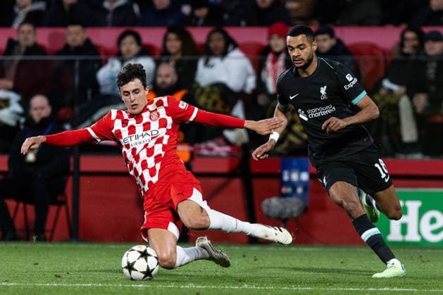 December 10, 2024, Barcelona, Barcelona, Spain: Frances L of Girona and Cody Gackpo R of Liverpool seen in action during the match of matchday 2 to UEFA Champions League between Girona F.C and Liverpool F.C at Estadi Montilivi. Finals score; Girona F.C : Liverpool F.C Barcelona Spain - ZUMAs316 20241210_znp_s316_096 Copyright: xMartixSeguraxRamonedax