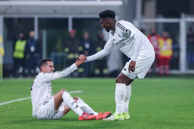 BERGAMO, ITALY - DECEMBER 10: Real Madrid™s Lucas Vazquez and Real Madrid™s Aurelien Tchouameni during the Champions League football match between Atalanta and Real Madrid C.F. at the Gewiss Stadium on December 10, 2024 in Bergamo, Italy. (Photo by Stefano Nicoli Speed Media Icon Sportswire) SOCCER: DEC 10 Champions League 2024 25 - Atalanta v Real Madrid C.F EDITORIAL USE ONLY Icon24121003375