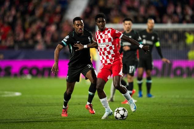 (241211) -- GIRONA, Dec. 11, 2024 -- Ryan Gravenberch (L) of Liverpool vies with Yaser Asprilla of Girona FC during the UEFA Champions League football match between Liverpool and Girona FC in Girona, Spain, Dec. 10, 2024. (Photo by Xinhua) (SP)SPAIN-GIRONA-FOOTBALL-CHAMPIONS LEAGUE-GIRONA FC VS LIVERPOOL JoanxGosa 