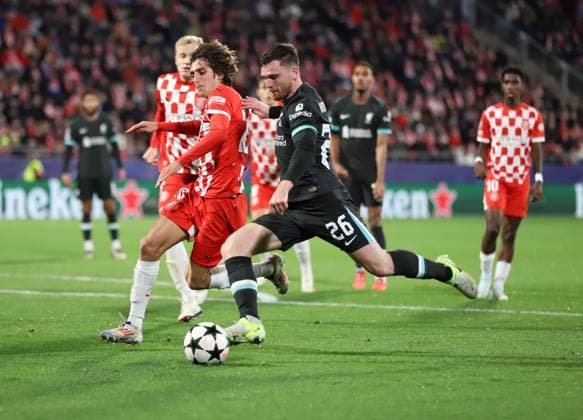 December 10, 2024, Sabadell, Barcelona, Spain: Barcelona Spain 10.12.2024 Bryan Gil ( Girona FC) and Andrew Robertson (Liverpool FC) battle for the ball during the UEFA Champions League between Girona FC and Liverpool FC at Montilivi on 10 December 2024 in Girona. Sabadell Spain - ZUMAu50_ 20241210_zsp_u50_060 Copyright: xXavixUrgelesx