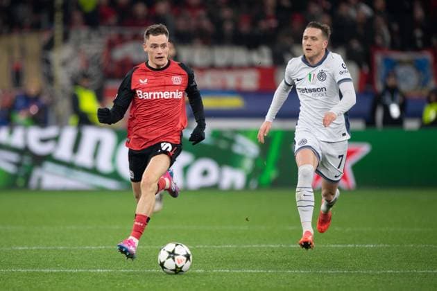 Florian WIRTZ LEV vs Piotr ZIELINSKI Inter action, duel, Football Champions League, Matchday 6, Bayer 04 Leverkusen LEV Inter Milan Inter 1 0 on 10 12 2024 in Leverkusen Germany UEFA regulations prohibit any use of photographs as image sequences and or quasi video Â