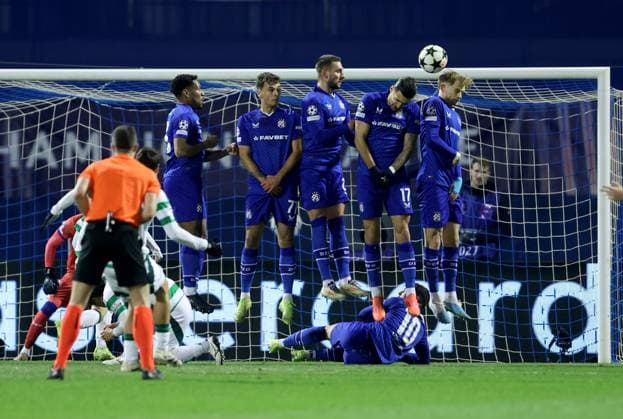 (241211) -- ZAGREB, Dec. 11, 2024 -- GNK Dinamo s players defend a free kick by Nicolas Kuhn of Celtic FC during the UEFA Champions League match between GNK Dinamo and Celtic FC in Zagreb, Croatia, Dec. 10, 2024. (Photo by PIXSELL via Xinhua) (SP)CROATIA-ZAGREB-FOOTBALL-UEFA CHAMPIONS LEAGUE-DINAMO VS CELTIC SanjinxStrukic 
