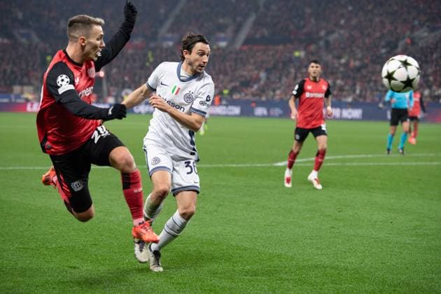 Matteo DARMIAN Inter vs Alejandro GRIMALDO LEV action, duel, Football Champions League, Matchday 6, Bayer 04 Leverkusen LEV Inter Milan Inter 1 0 on 10 12 2024 in Leverkusen Germany UEFA regulations prohibit any use of photographs as image sequences and or quasi video Â