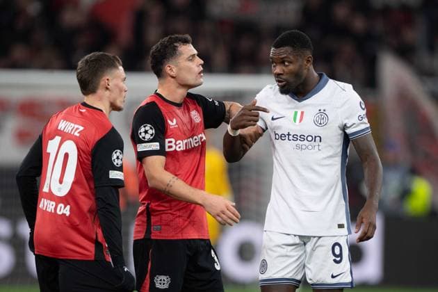 v l Florian WIRTZ LEV , Granit XHAKA LEV and Marcus THURAM Inter , gestures, gesticulated, argument, discussion, Football Champions League, Matchday 6, Bayer 04 Leverkusen LEV Inter Milan Inter 1 0 on 10 12 2024 in Leverkusen Germany UEFA regulations prohibit any use of photographs as image sequences and or quasi video Â