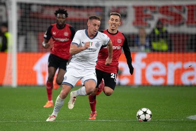 Davide FRATTESI Inter vs Alejandro GRIMALDO LEV action, duel, Football Champions League, Matchday 6, Bayer 04 Leverkusen LEV Inter Milan Inter 1 0 on 10 12 2024 in Leverkusen Germany UEFA regulations prohibit any use of photographs as image sequences and or quasi video Â