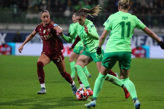 VfL vs AS Rome, CL Women Wolfsburg, 11 12 2024, FOOTBALL VfL Wolfsburg vs AS Rome, group round Champions League Women, season 2024 25 Sanne Troelsgaard AS Rome , Jule Brand VfL Wolfsburg Wolfsburg