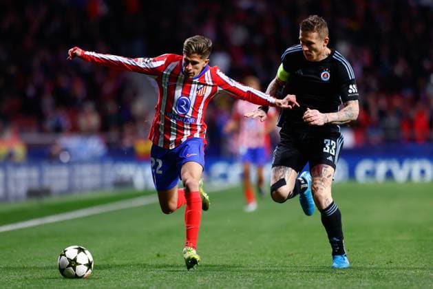 December 11, 2024, Madrid, Madrid, SPAIN: Giuliano Simeone of Atletico de Madrid and Juraj Kucka of Slovan Bratislava in action during the UEFA Champions League 2024 25 League Phase MD6 match between Atletico de Madrid and SK Slovan Bratislava at Riyadh Air Metropolitano stadium on December 11, 2024 in Madrid, Spain. Madrid SPAIN - ZUMAa181 20241211_zaa_a181_019 Copyright: xDennisxAgyemanx