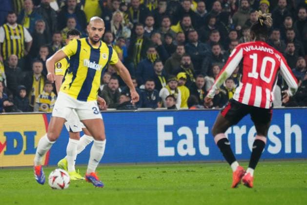 Sofyan Amrabat (L) of Fenerbahce and Nico Williams of Athletic Bilbao battle for the ball during the UEFA Europa League 2024 25 League Phase MD6 match between Fenerbahce SK and Athletic Club at on December 11, 2024 in Istanbul, Turkey. (Photo by Seskimphoto ) Fenerbahce v Athletic Bilbao - UEFA Europa League 