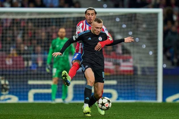 Jose Gimenez of Atletico de Madrid and Nino Marcelli of SK Slovan Bratislava Atletico de Madrid v Slovan Bratislava. UEFA Champions League match. Date 6. Football, Riyadh Air Metropolitano Stadium, Madrid, Spain - 11 Dic 2024 Editorial use only  Copyright: xPRESSINPHOTO Shutterstockx 14994194ad