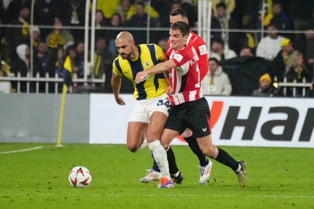 Sofyan Amrabat (L) of Fenerbahce and Inigo Ruiz (16) of Athletic Bilbao battle for the ball during the UEFA Europa League 2024 25 League Phase MD6 match between Fenerbahce SK and Athletic Club at on December 11, 2024 in Istanbul, Turkey. (Photo by Seskimphoto ) Fenerbahce v Athletic Bilbao - UEFA Europa League 