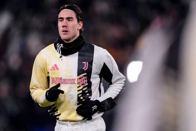 Juventus™ Dusan Vlahovic before the Uefa Champions League soccer match between Juventus Fc and Manchester City at the Juventus stadium in Turin, north west Italy - December 11, 2024. - Soccer .  Copyright: xFabioxFerrari LaPressex