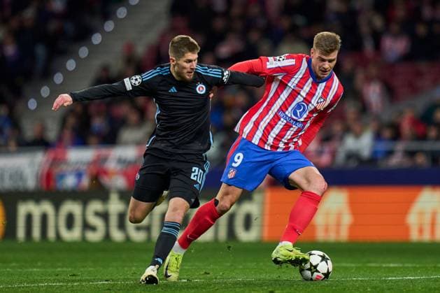 Alexander Sorloth of Atletico de Madrid and Alen Mustafic of SK Slovan Bratislava Atletico de Madrid v Slovan Bratislava. UEFA Champions League match. Date 6. Football, Riyadh Air Metropolitano Stadium, Madrid, Spain - 11 Dic 2024 Editorial use only  Copyright: xPRESSINPHOTO Shutterstockx 14994194ag