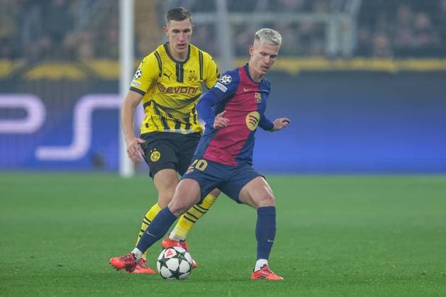 11 12 2024, UEFA Champions League, Borussia Dortmund FC Barcelona, Matchday 8, Signal Iduna Park, Season 2024 2025 Nico Schlotterbeck BVB 4 in duel against Dani Olmo Barca 20 North Rhine-Westphalia Germany